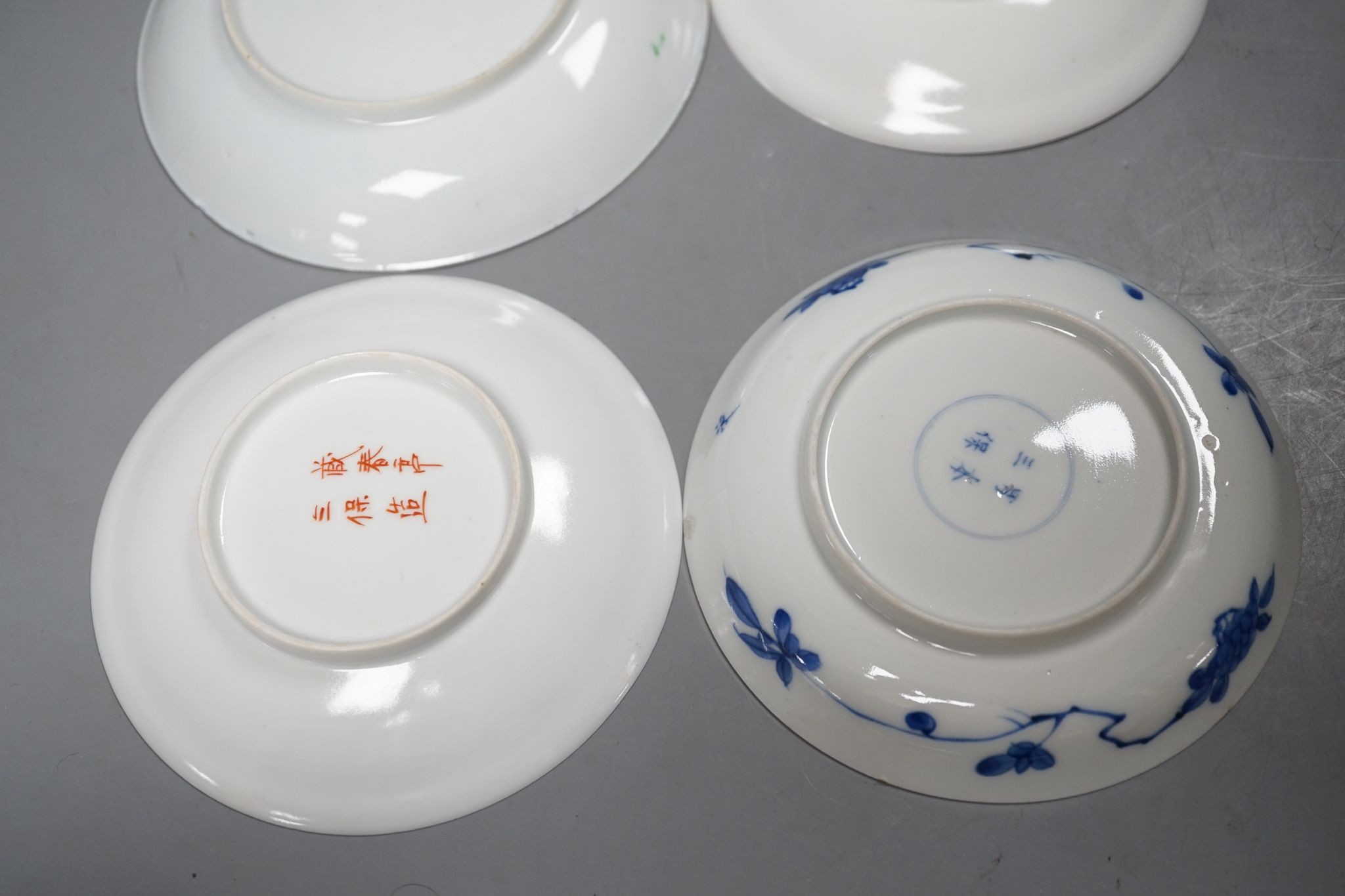 A group of Japanese porcelain tea wares and a rice bowl and cover